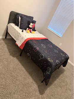 Twin metal bed frame with twin 12 inch mattress