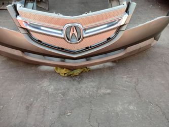 2007-2009 Acura MDX complete front bumper with all the accessories OEM.
