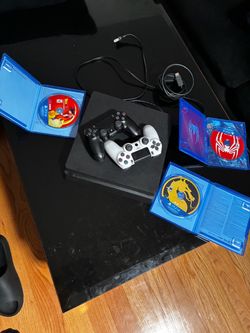 PS4 Slim Bundle with 2 Controllers and 3 Games