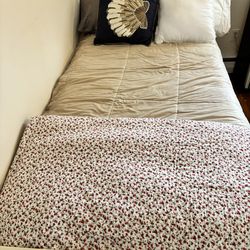 White wood twin bed