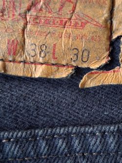 Men's levi's working pants used  38 30
