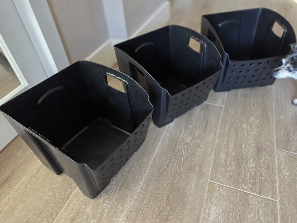 Set of three Rubbermaid storage containers