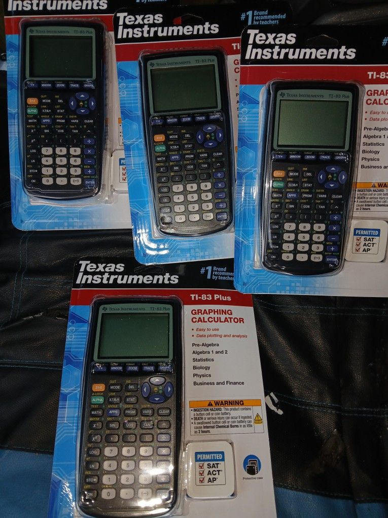 4 Texas Instruments TI-83 Plus Graphing Calculators