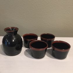 Japanese Style Cups And A Jar