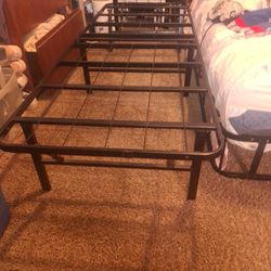 2.     1.    Man Metal Fold Up Cot Frames
