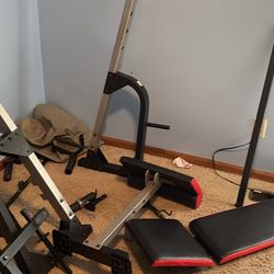 Golds gym workout bench and barbell holder