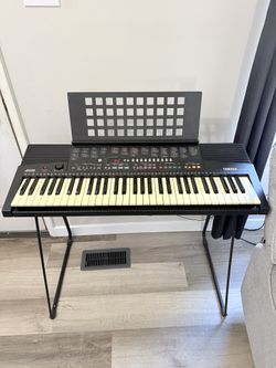 Vintage Yamaha PSR-210 PortaTone electronic keyboard. Made in Japan