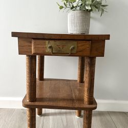 Vintage Solid Wood Mid-century occasional Table with a single drawer and brass pull hardware $90