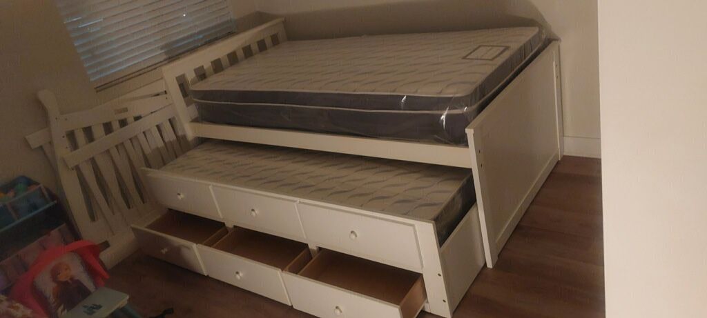    Twin captain bed with drawer trundle-$330.00. With mattresses-$499. Colors espresso or white. Assembly required. Assembly not included. Free delive