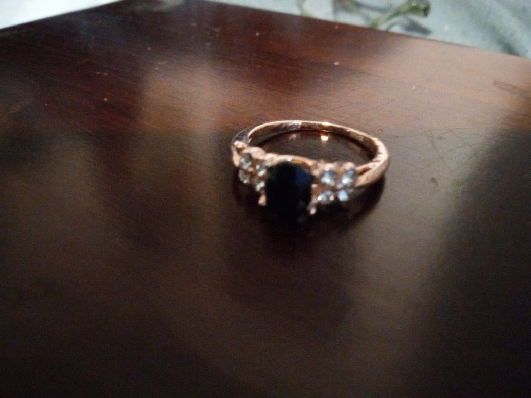 studded black gemstone ring