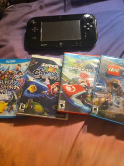 Nintendo Wii U 32GB Black with Lego jurassic world Mario Kart  Super Smash Bros and Mario galaxy controller charger and cover all 200