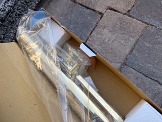Brass colored light fix new in Box