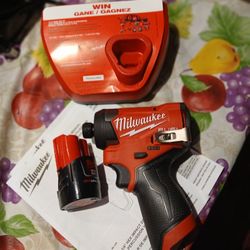 12v Milwaukee Fuel Brushless Impact Drill  And Battery 2 .0ah With Charger 