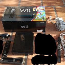 NINTENDO WII LIKE NEW, STILL IN PLASTIC WRAPS AND IN BOX! $150...PRICE IS FIRM