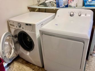 Front load washer and gas dryer