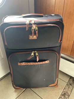 Checked size suitcase 29”