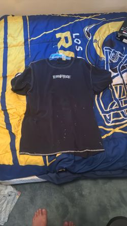 Empyre Shirt With Paint On It.