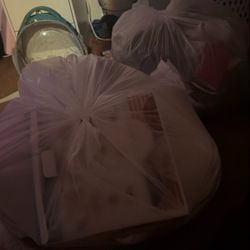 Two really big bags of teen and young adult clothes