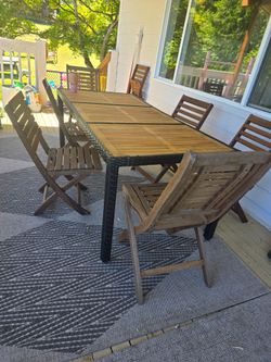 Outdoor Table And 7 foldable chairs