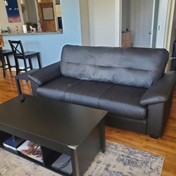 Couch, Coffee Table, And Bookshelf