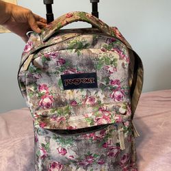 Woman’s Backpack With Wheels