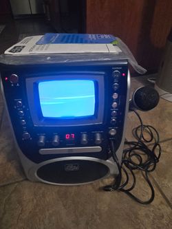 The singing machine. Brand new