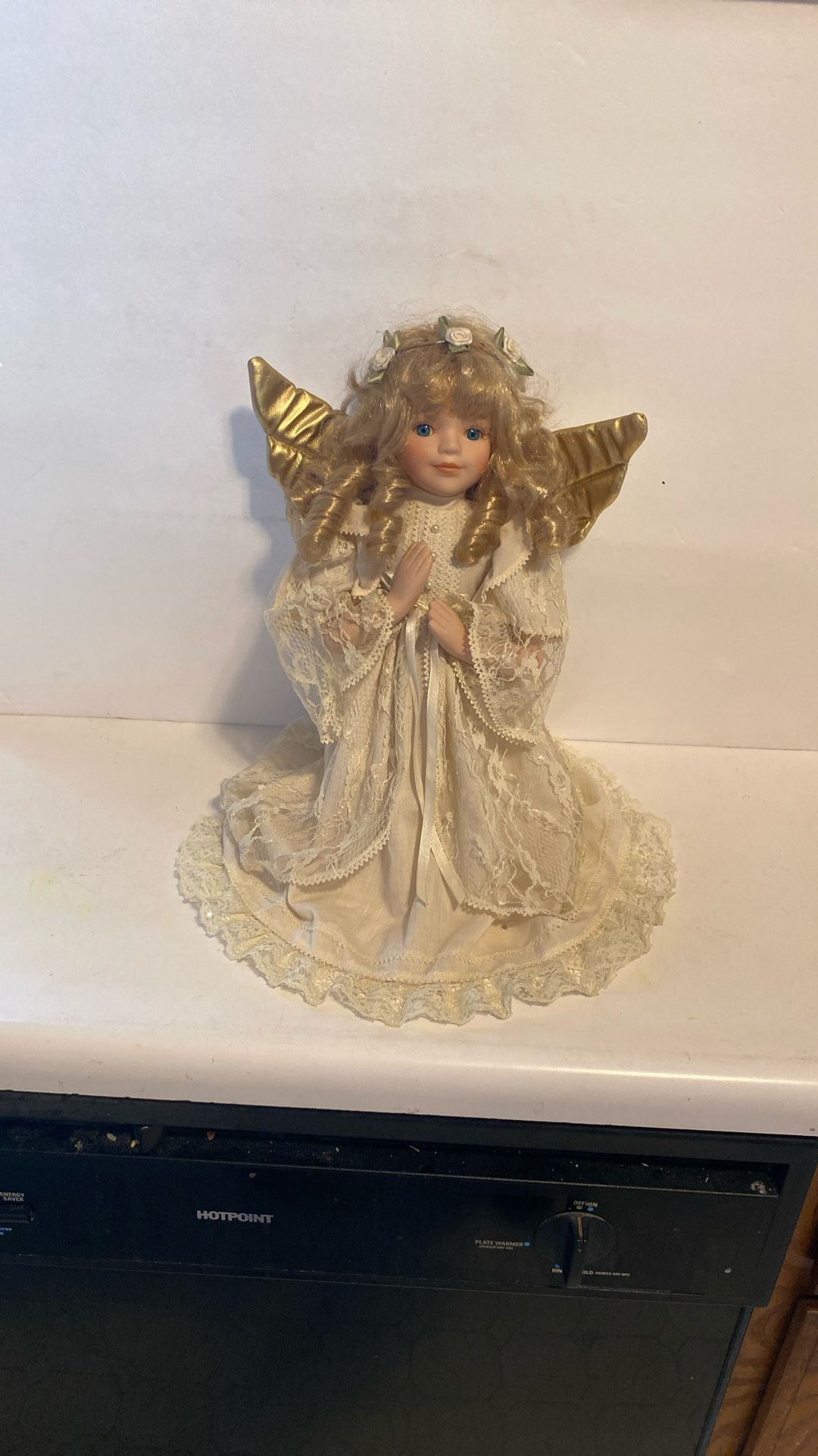 Angel Doll That Is kneeling. See all pictures. 14 inches.