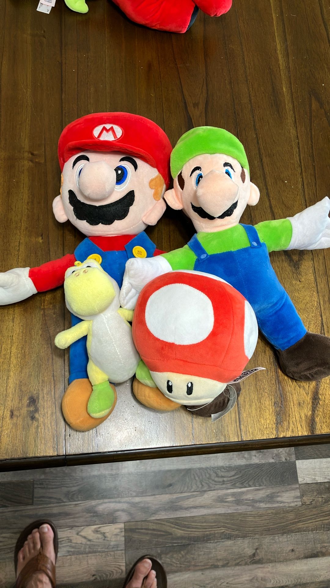 Assorted Mario Bros stuffed Animals