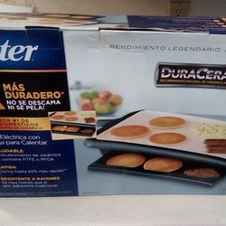 ELECTRIC GRIDDLE WITH WEARING TRAY.