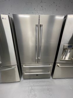 Bertazzo stainless steel refrigerator (36" x 69" x 24") with a receipt covering a 90-day warranty.