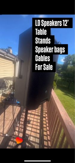 DJ Setup Speakers Table Cables Stands Bags