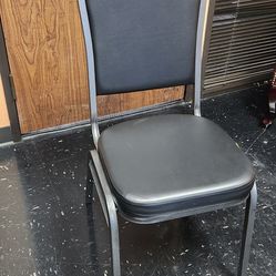 Metal chairs with black vinyl