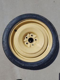 TOYOTA CAMRY 17"  SPARE DONUT TIRE  5X114.3 SAME AS 5X4.5 BOLT PATTERN ALMOST NEW