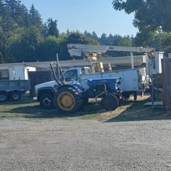 Tractor This Is A Great Tractor To Use Around The Property It Comes With Two Attachments