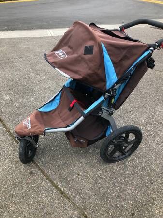 BOB REVOLUTION Jogging Stroller brown/blue with swivel wheel