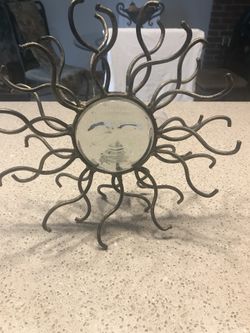 Metal and glass candle holder