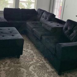 Black Water Resistant Fabric Reversible Sectional With Cup Holder And Storage Ottoman. Brand New.