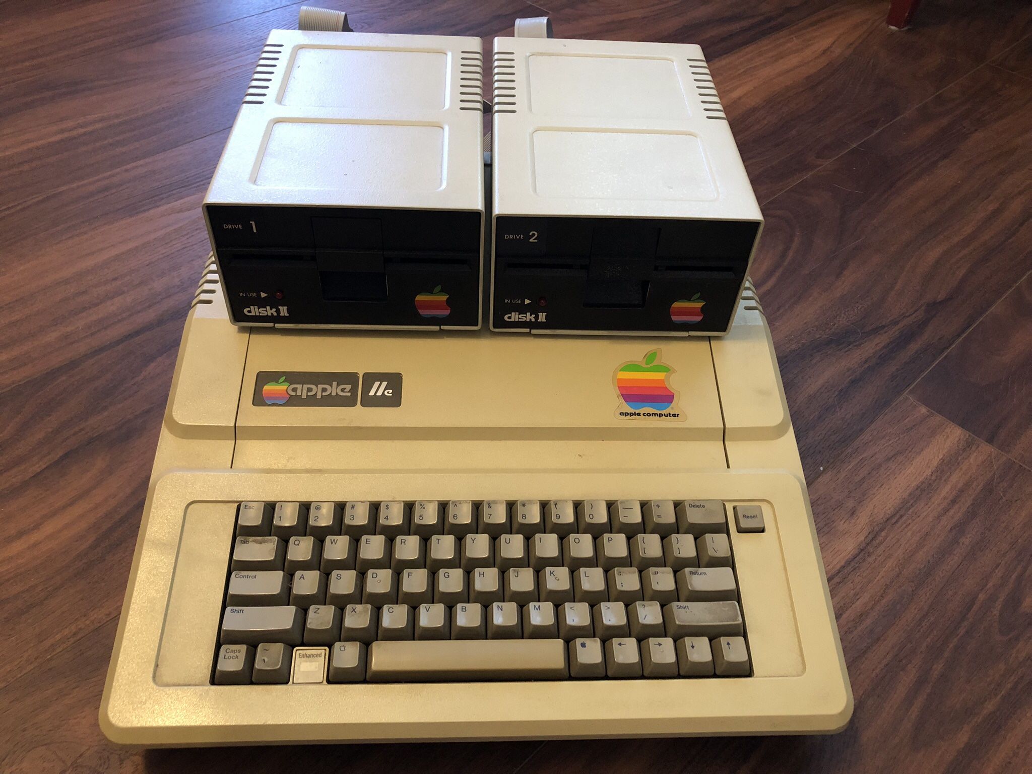Vintage Apple II PLUS and Apple IIe computers, tons of Manuals, Floppy Discs, functioning Apple Monitor & Accessories