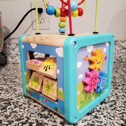 Montessori play cube toy with shape blocks