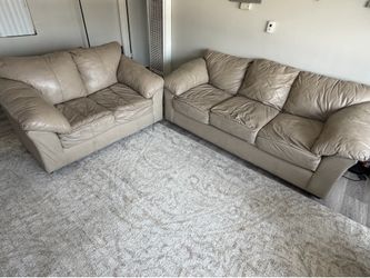 Used Leather Couch and Loveseat  with cover for it – $150 for Both (Negotiable)