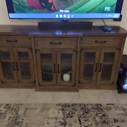 Member's Mark Fenton 75" Console in a brown finish. 