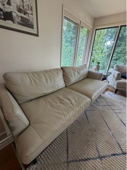 White Leather Couch with Two Large Chairs