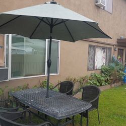 Mesa de patio con 4 sillas