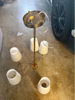 Modern Brass five light chandelier