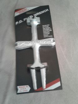 Plumbing tool plug wrench