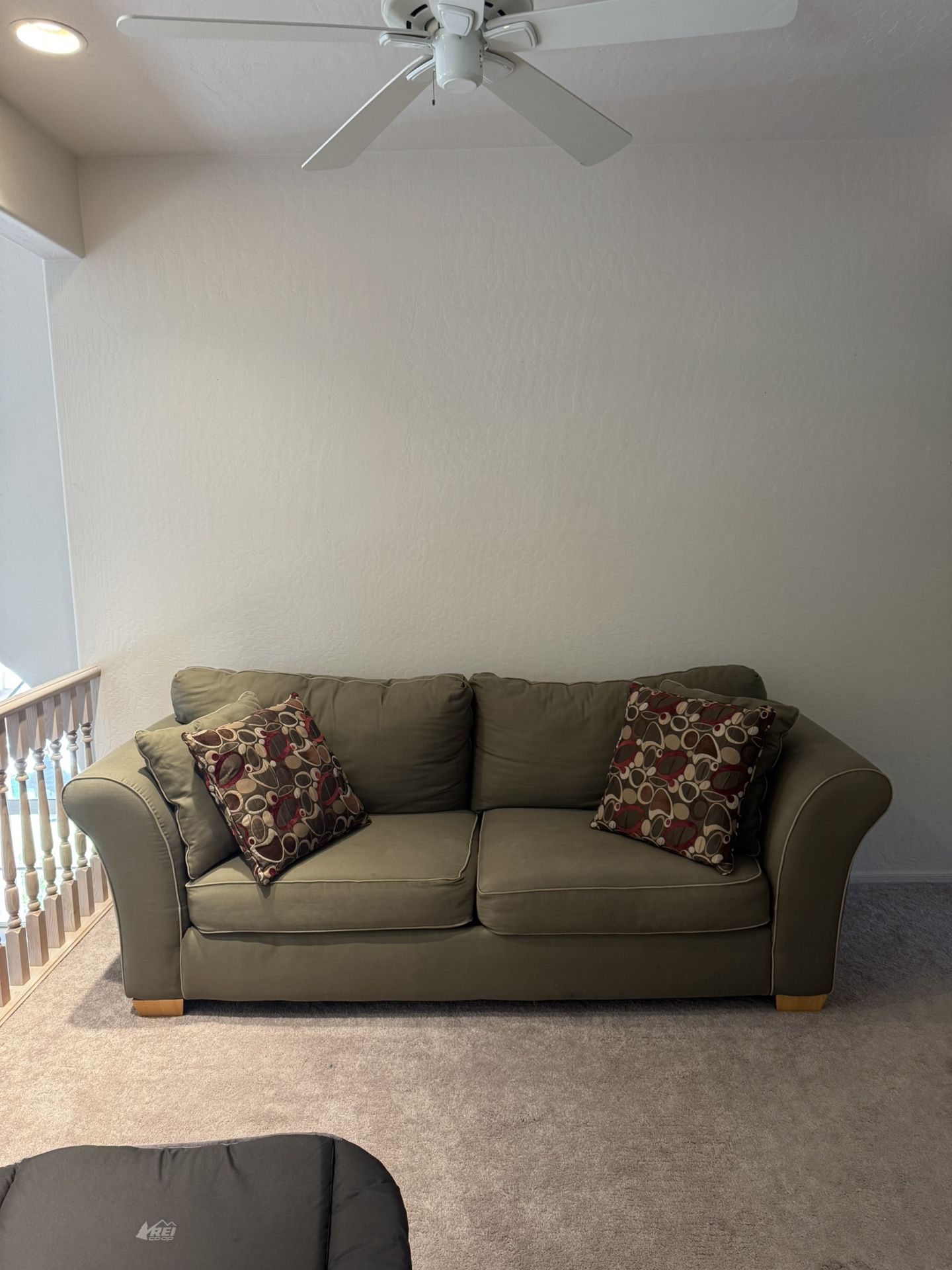 Green Couch With Pillows