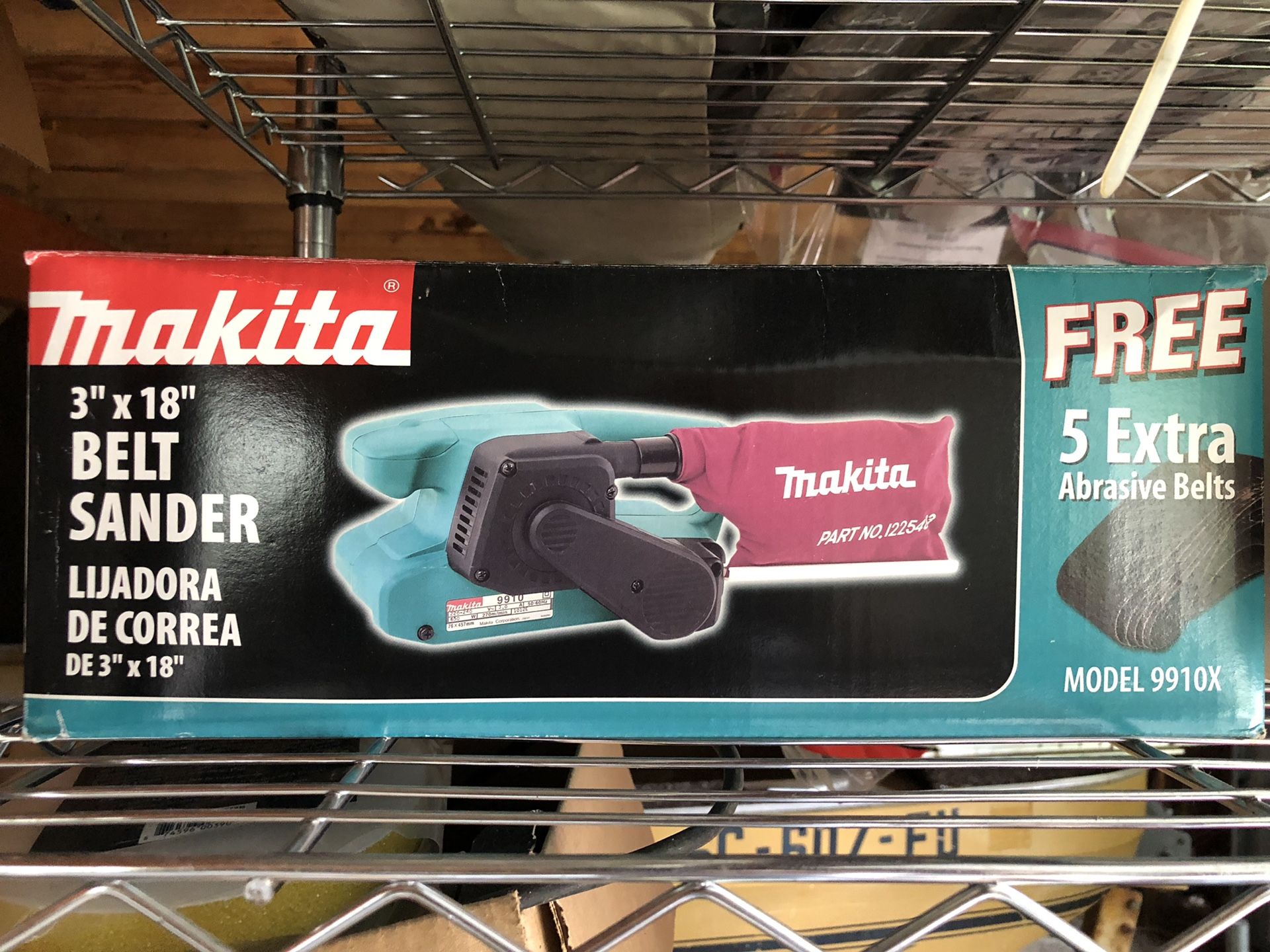 Makita 3 x 18 belt sander w/ 5 extra belts