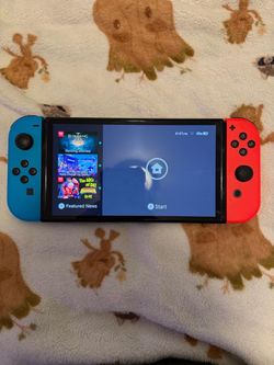 Nintendo Switch oled with 2 games