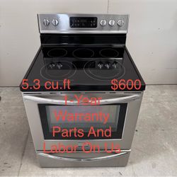 Frigidaire 30-in Glass Top 5 burners 5.3-cu ft Air Fry Convection Oven Freestanding Electric Range ( Stainless Steel )