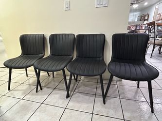Dinning leather chairs (4)